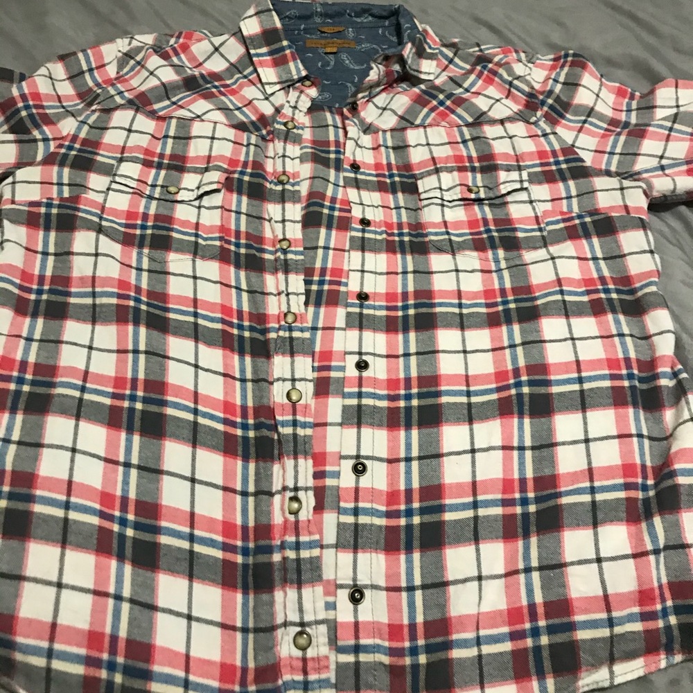 Jach’s girlfriend coral plaid flannel